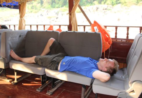 Matt Relaxing On Boat In Laos